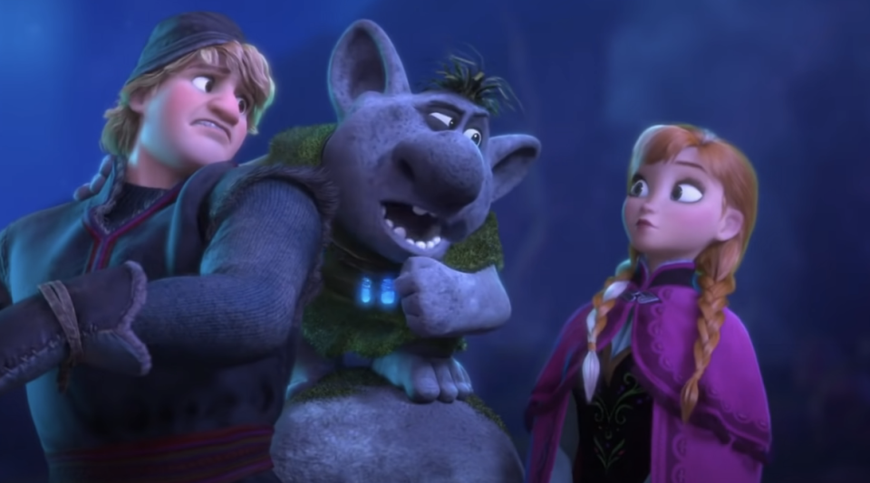 Kristoff and Anna with one of the trolls