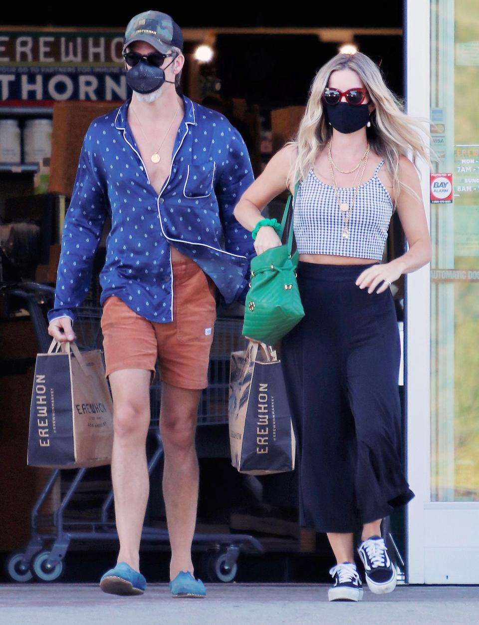 <p>Chris Pine and girlfriend Annabelle Wallis stock up on groceries at their local organic grocery store on Saturday in Los Angeles. </p>