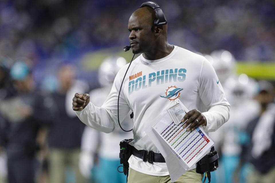 FILE - In this Nov. 10, 2019, file photo, Miami Dolphins head coach Brian Flores watches from the sidelines during the first half of an NFL football game against the Indianapolis Colts in Indianapolis. Pro football is discovering that the spirit of the Rooney Rule is being violated. NFL Commissioner Roger Goodell made that a point of emphasis in his state of the league speech during Super Bowl week. So count on Goodell finding ways to more strongly implement the policy that requires teams to interview minority candidates for coaching and executive positions.(AP Photo/Darron Cummings, File)