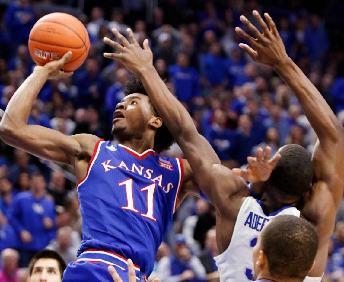 Kansas freshman star Josh Jackson (11) got the better of UK frosh stars Bam Adebayo, DeAaron Fox and Malik Monk in Rupp Arena in 2016-17.