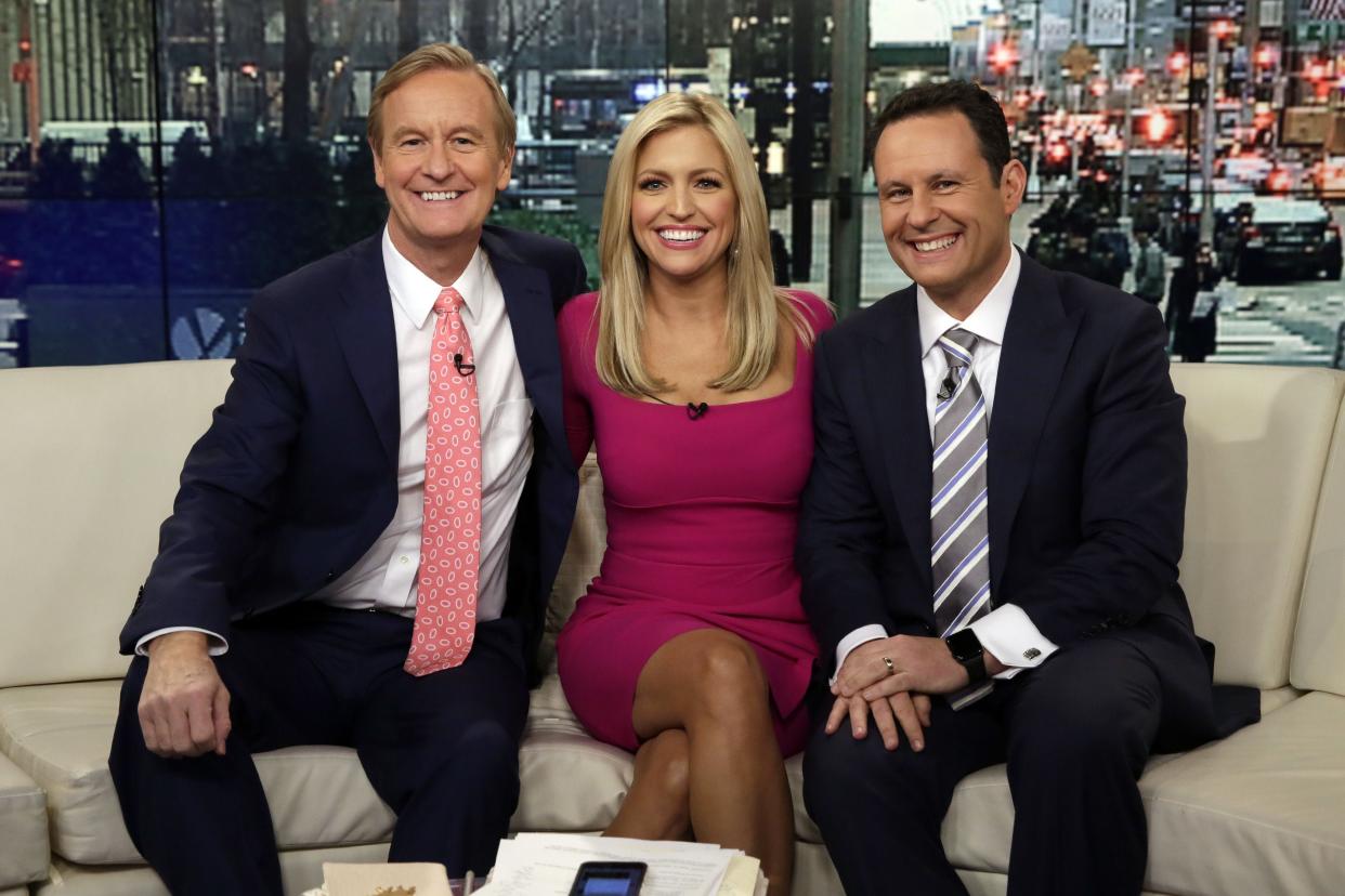 Steve Doocy, from left, Ainsley Earhardt and Brian Kilmeade appear on a broadcast of "Fox & Friends" in New York. Kilmeade will do a segment of Tuesday's show from the Metro Diner in Ponte Vedra Beach.