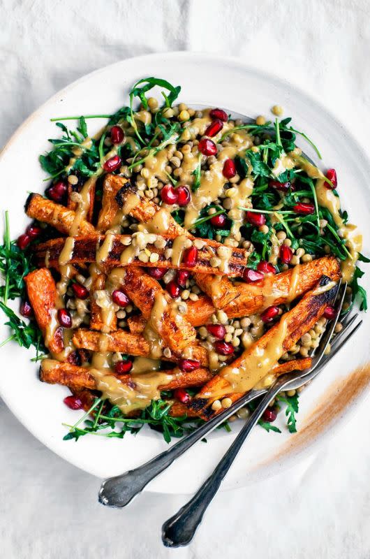 <p>Occasionally Eggs</p><p>This easy roasted carrot salad is mixed with lentils and greens, then topped with a creamy dairy-free tahini dressing for an easy weeknight dinner great all year.</p><p><strong>Get the recipe: <a href="https://www.occasionallyeggs.com/spicy-roasted-carrots-with-tahini-lentil-salad/" rel="nofollow noopener" target="_blank" data-ylk="slk:Spicy Roasted Carrots with Tahini Lentil Salad;elm:context_link;itc:0;sec:content-canvas" class="link ">Spicy Roasted Carrots with Tahini Lentil Salad</a></strong></p>