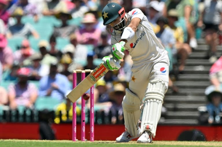 Pakistan's Mohammad Rizwan plays a shot during the first day of the third Test match against <a class="link " href="https://sports.yahoo.com/soccer/teams/australia/" data-i13n="sec:content-canvas;subsec:anchor_text;elm:context_link" data-ylk="slk:Australia;sec:content-canvas;subsec:anchor_text;elm:context_link;itc:0">Australia</a> at the Sydney Cricket Ground (Saeed KHAN)