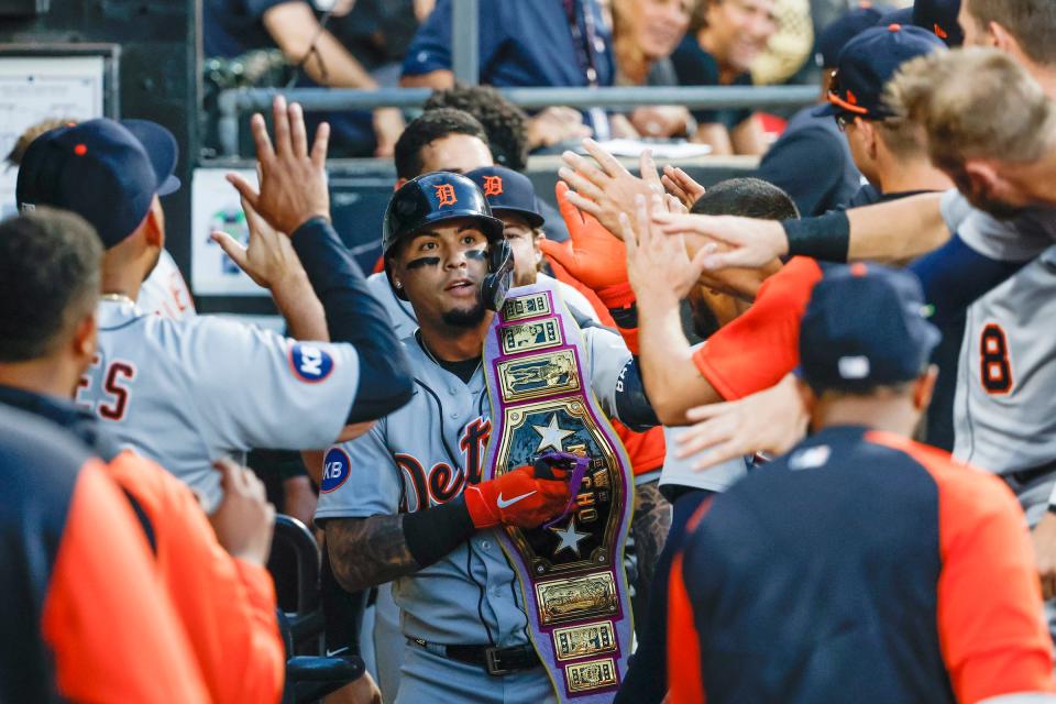 Detroit Tigers shortstop Javier Baez (28) celebrates with teammates after hitting a solo home run against the Chicago White Sox during the fourth inning at Guaranteed Rate Field.