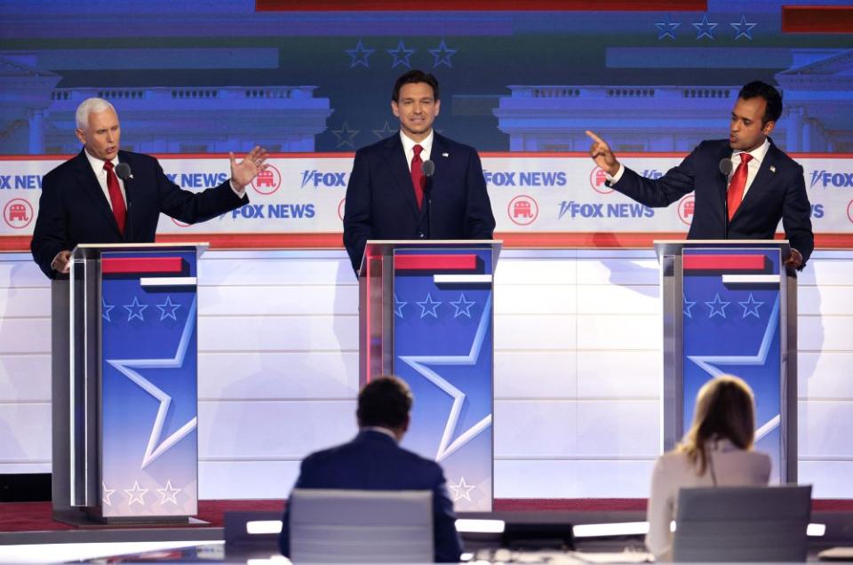 Republican presidential candidates, former Vice President Mike Pence, Florida Gov. Ron DeSantis and Vivek Ramaswamy participate in the first debate of the GOP primary season in Milwaukee, Wis. on Aug. 23.<span class="copyright">Win McNamee—Getty Images</span>