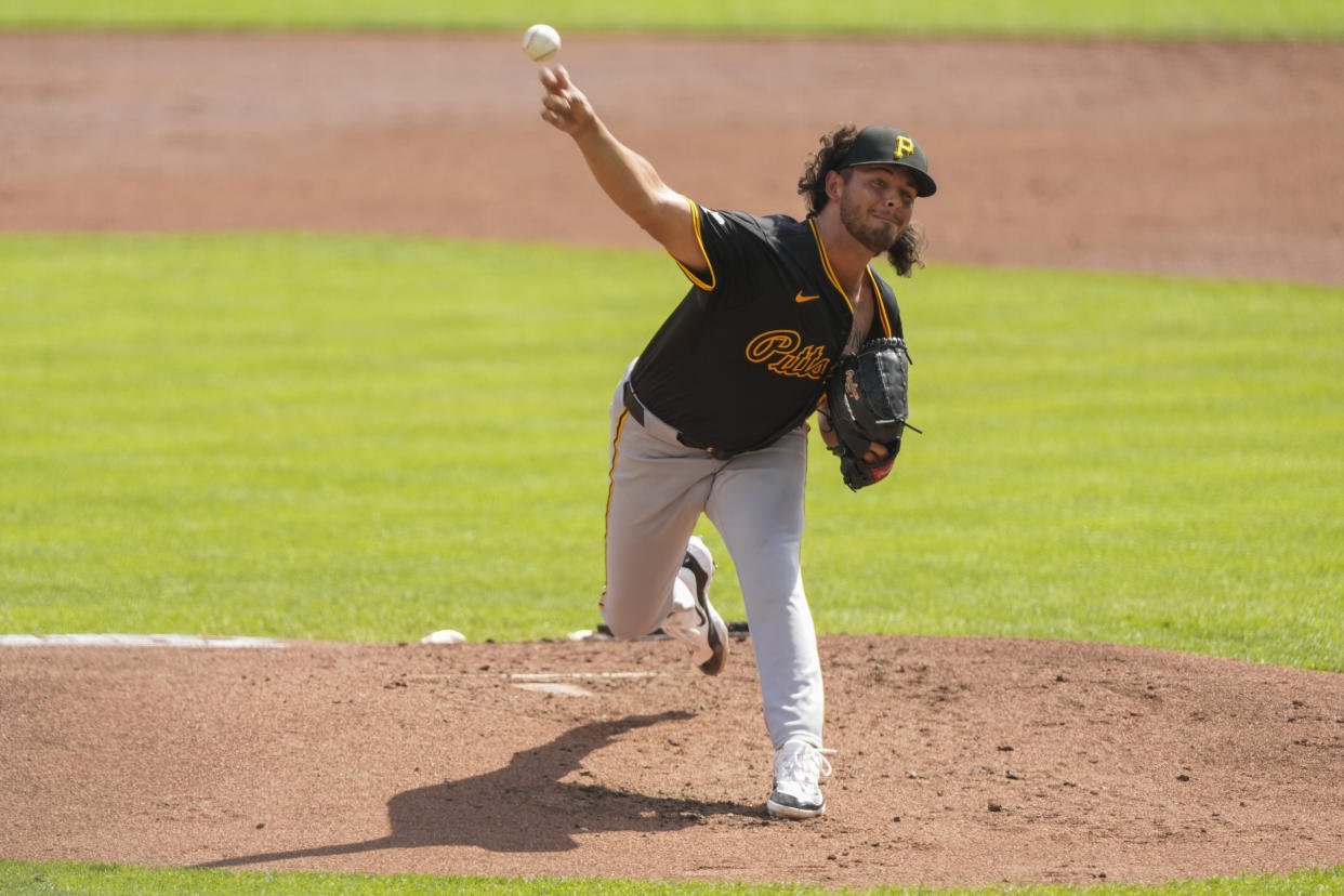 Pittsburgh Pirates starting pitcher Jared Jones throws during the first inning of a baseball game against the Cincinnati Reds, Saturday, Sept. 21, 2024, in Cincinnati. (AP Photo/Carolyn Kaster)