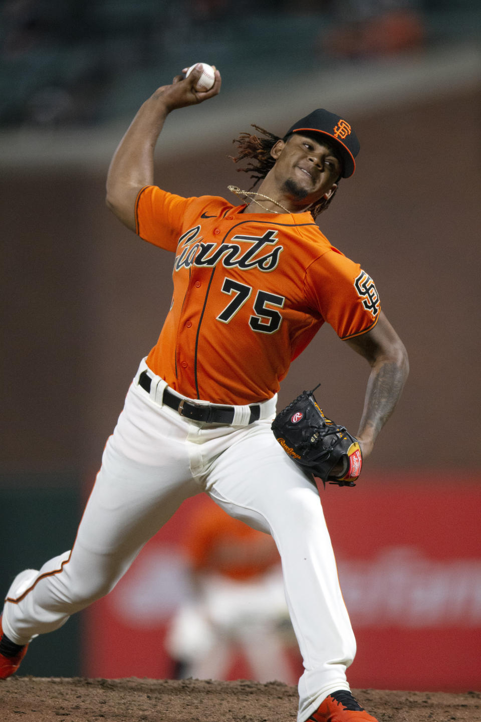 San Francisco Giants' Camilo Doval (75) delivers a pitch against the San Diego Padres during the seventh inning of a baseball game Friday, May 7, 2021, in San Francisco. (AP Photo/D. Ross Cameron)