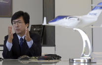 In this July 30, 2019, photo Honda Aircraft Co. president and CEO Michimasa Fujino responds during an interview at the company headquarters in Greensboro, N.C. Nearly four years after delivering its first jet, Honda is facing decisions as the company better known for cars and lawnmowers considers whether to sink billions more into its decades-in-the-making aircraft division. (AP Photo/Gerry Broome)