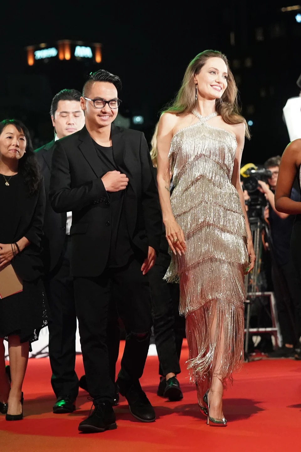 TOKYO, JAPAN - OCTOBER 03: Angelina Jolie (R) and son Maddox Jolie-Pitt attend the Japan premiere of 'Maleficent: Mistress of Evil' on October 03, 2019 in Tokyo, Japan. (Photo by Christopher Jue/Getty Images for Disney)