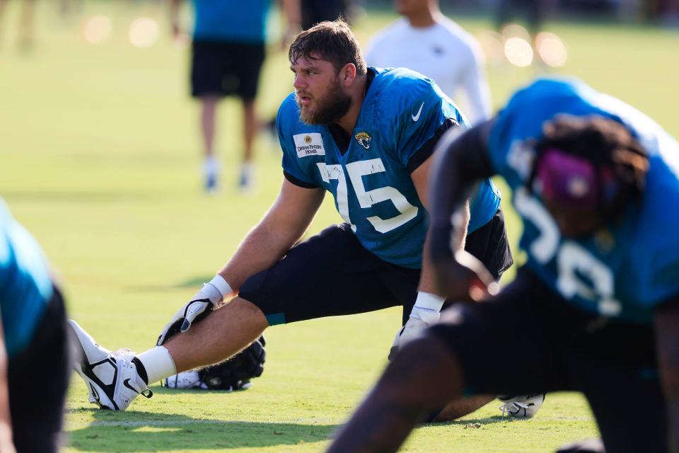 Jacksonville Jaguars guard Cooper Hodges (75) stretches Tuesday, Aug. 1, 2023 at Miller Electric Center at EverBank Stadium in Jacksonville, Fla. Today marked the first padded practice. 