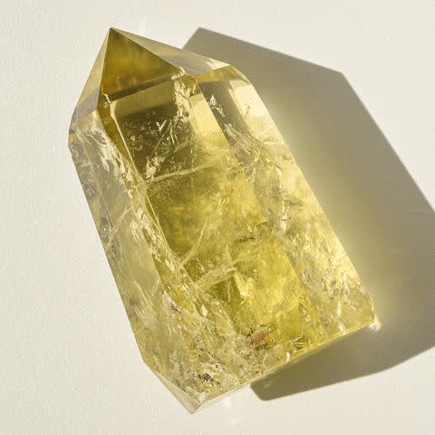 <p>Getty</p> Crystal healing, yellow citrine, quartz tower