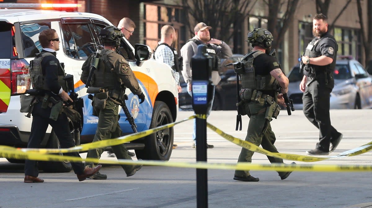 Police at the scene of a mass shooting in Louisville, Kentucky, on April 10  (Michael Clevenger / USA Today Network via Reuters)