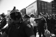<p>Cleveland Police Chief Calvin D. Williams (center in white) on the scene of a clash with protesters outside of the convention. (Photo: Khue Bui for Yahoo News)</p>
