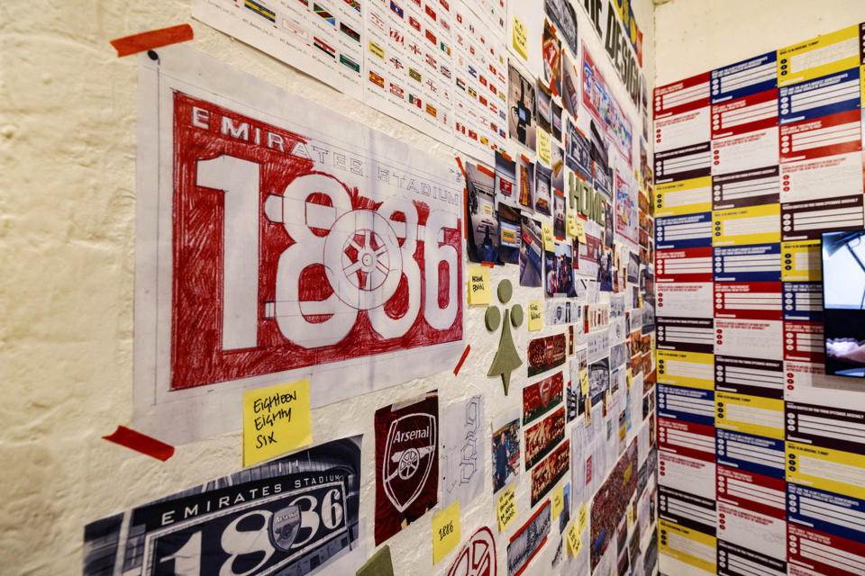 In this photo provided by Arsenal Football Club on Wednesday, Jan. 11, 2023, a view of designs to feature on the exterior of the Emirates Stadium displayed at the Candid Arts Trust in London. (Arsenal Football Club via AP)