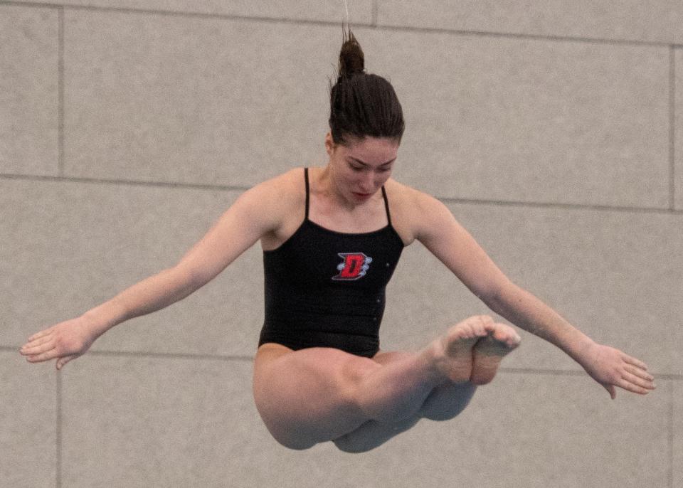 Dover’s Taylor Tuohy competes in the District 3 Class 3A diving competition at Dover High School on Saturday, Feb. 24, 2024.