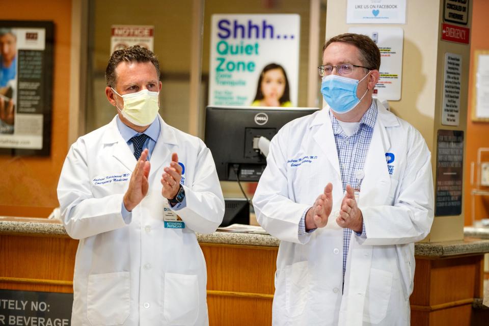 JFK Memorial Hospital physicians Dr. Andrew Kassinove, left, and Dr. Andrew McCague celebrate the hospital's new designation as a Level 4 Trauma Center in Indio, Calif., on September 29, 2021. 