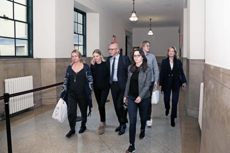 <div class="inline-image__caption"><p>Paul Haggis leaves court accompanied by his family and ex-wife Deborah Rennard, far left, who testified in his defense.</p></div> <div class="inline-image__credit">Dorian Geiger</div>