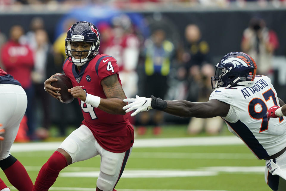 Houston Texans quarterback Deshaun Watson (4) is pressured by Denver Broncos linebacker Jeremiah Attaochu (97) during the first half of an NFL football game Sunday, Dec. 8, 2019, in Houston. (AP Photo/David J. Phillip)