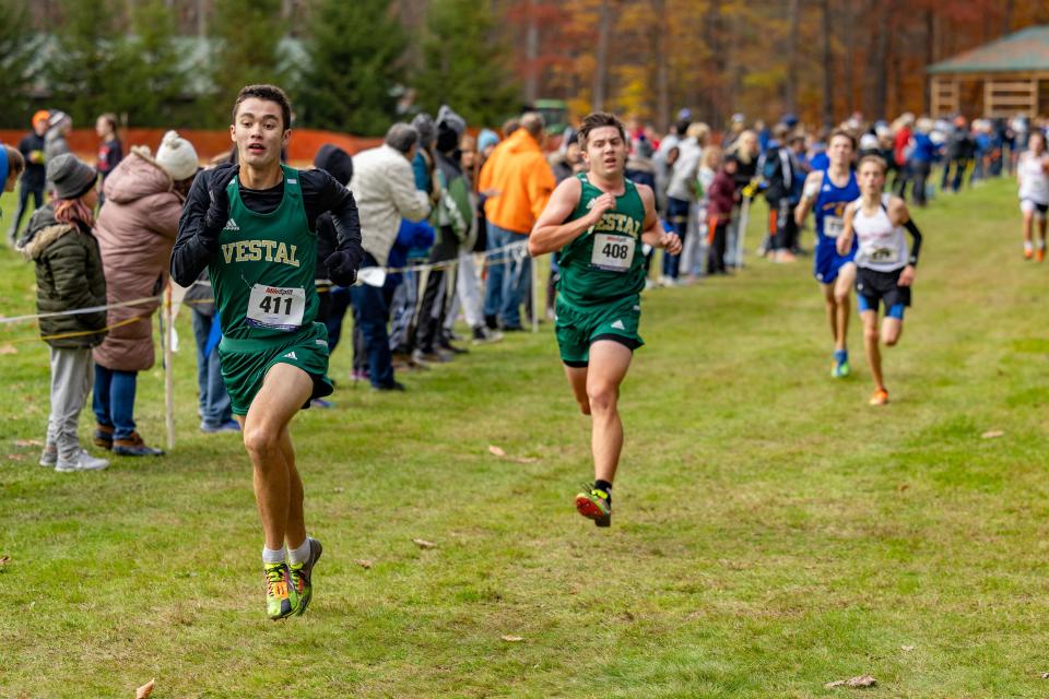 Takumi Guay of Vestal leads teammate Frank Consolazio to the line at the Section 4 Class B boys cross country championship Nov. 2, 2023 at Chenango Valley State Park.