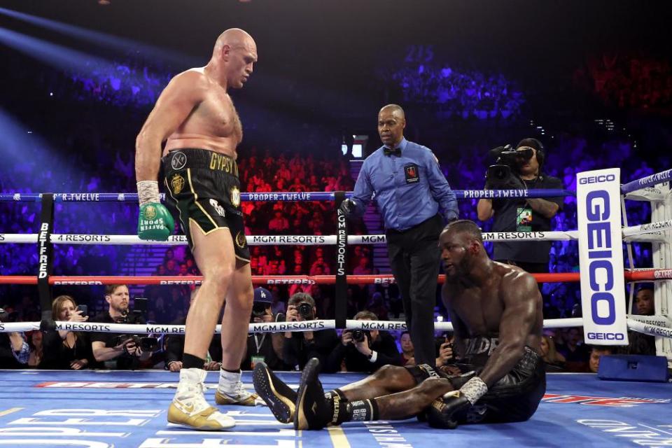 Fury knocks down Deontay Wilder in the fifth round.