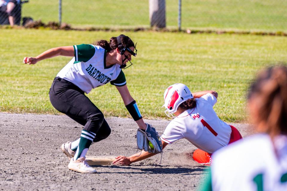 New Bedford's Sydnee Ramos beats the tag to second base from Dartmouth's Aubrey Carberry.