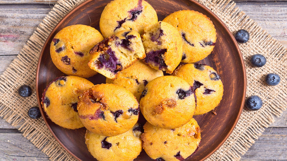 Mini blueberry muffins served on a copper color plate