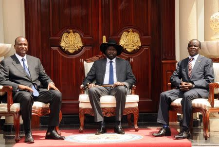 South Sudan's President Salva Kiir (C) poses for a photograph with First Vice President Taban Deng Gai (L) and Second Vice President James Wani Igga (R) at the Presidential Palace in the capital of Juba, South Sudan, July 26, 2016. REUTERS/Jok Solomun