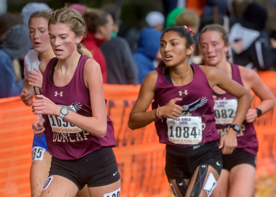 Dunlap's Abby Tudeen (1090), Saniya Mathew (1084) and Abbie Gleason compete in the Class 2A girls state cross-country meet Saturday, Nove. 5, 2022 at Detweiller Park in Peoria.
