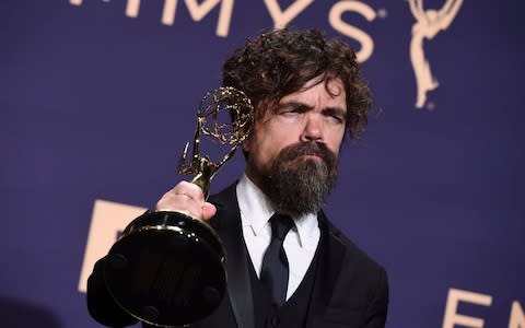 Peter Dinklage, winner of the awards for outstanding supporting actor in a drama series and outstanding drama series for "Game of Thrones" - Credit: AP