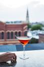 <p><strong>What'd you think of the place?</strong><br> No ordinary rooftop bar, this. The <a href="https://www.cntraveler.com/hotels/charleston/the-vendue?mbid=synd_yahoo_rss" rel="nofollow noopener" target="_blank" data-ylk="slk:Vendue Hotel;elm:context_link;itc:0;sec:content-canvas" class="link ">Vendue Hotel</a> lures in its cocktail-drinking prey with a two-tiered rooftop experience, both levels encompassing different covered and uncovered levels, with the entire environs enlivened by playful Pop-Art installations that will keep the Instagram generation snap-happy. Wooden decking and sun-shaded wicker furniture mixes with chic lighting and gleaming bar tops for a high-end rooftop adventure. The harbor views don’t hurt.</p> <p><strong>Who else is there?</strong><br> It’s a bar of two levels and a tale of two bars. During the week or pre-sunset on weekends, expect a more grown-up crowd of sophisticates chatting to the bar staff about barrel-aged bourbons and sipping eclectic drinks before heading out to dinner. Once the sun dips past the horizon, Fridays and Saturdays especially become more lively, with young professionals blowing off steam. But they don’t blow too hard, and the cross breezes keep things chill.</p> <p><strong>And the drinks? Anything special?</strong><br> The cocktail list is at once recognizable, but then it has you looking again at the twists the staff have spun on the classics. Their margarita comes ‘picante’ and their mule is peach-flavored. The gin and Aperol freshness of the Gypsy Lips is a firm favorite as the weather warms up, as is their In Too Deep grapefruit-vodka concoction. Beers and wines run a reassuring gamut of international and local.</p> <p><strong>How was the food?</strong><br> As with the drinks, the impressively diverse food offering is mostly favorites with a little something extra. The crab fritters are deviled, the sliders come with shrimp, and the steak salad has a Korean tinge. There’s a pleasing sandwich selection (the blackened salmon BLT is a treat—trust us), and sides from fries to tabouleh.</p> <p><strong>Was the service any good?</strong><br> Knowledgeable bar and waitstaff smile through the vodka soda orders of roving <a href="https://www.cntraveler.com/gallery/bachelor-bachelorette-party-destinations?mbid=synd_yahoo_rss" rel="nofollow noopener" target="_blank" data-ylk="slk:bachelorette parties;elm:context_link;itc:0;sec:content-canvas" class="link ">bachelorette parties</a>, and if you can slice out some conversation during quiet spells, they’re as friendly as can be.</p> <p><strong>So, why are we coming here?</strong><br> The built-in variety of the two levels is a big draw, as are the views, of course. The cocktail list is just quirky enough without being intimidating, and don’t forget to take a photo posing as the couple from American Gothic in the interactive display by the downstairs elevator doors.</p>