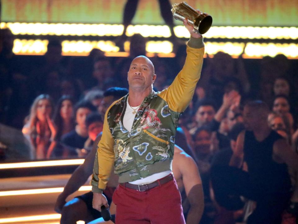 Dwayne “The Rock” Johnson made a moving acceptance speech when he took home the Icon Generation Award at this year’s MTV Movie & TV Awards.The prize celebrates actors whose contributions to film and television have had a positive impact on society. Past recipients include Reese Witherspoon Sandra Bullock, Tom Cruise, Robert Downey Jr, Will Smith, Chris Pratt and Jamie Foxx.The Rock explained how he had strived to achieve professional success in Hollywood despite facing obstacles over his appearance.Click through the gallery to see the best looks from this year's MTV AwardsThe semi-retired professional wrestler is now consistently ranked as one of the highest-paid actors in film, appearing in the Fast and Furious franchise as well as Baywatch, Jumanji: Welcome to the Jungle, and as the voice of Maui in Disney's Oscar-nominated animation Moana.“I thank you, all of you at home. You are the reason I'm getting this,” he began. “I want to share a really quick lesson with you guys, I've learned the most powerful thing we can be is ourselves.“We are still that little kid just aspiring to be something better, aspiring to be important. When I first got to Hollywood, Hollywood they didn't know what the hell to do with me. I mean I was half black, half Samoan, six-foot-four, 275-pound pro wrestler.“I was told at that time you've got to be a certain way, you've got to drop some weight, you've got to be somebody different, you've got to stop working out, stop doing the things that I love, you've got to stop calling yourself 'The Rock'. For years I bought into it because you think, 'Oh, that's what I'm supposed to do and I was miserable doing that. I made a choice that I wasn't going to conform to Hollywood, Hollywood was going to conform to me.”He concluded: “When I was 15, I heard a quote and I'll never forget it, ”It's nice to be important but it's more important to be nice.“See the full list of MTV Award winners here.