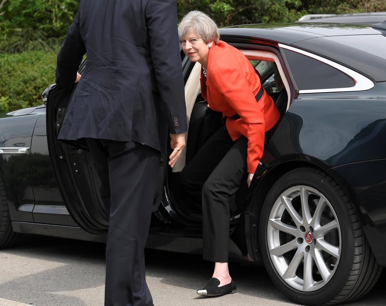 Theresa May arrives at an election campaign event in Wrexham: Reuters