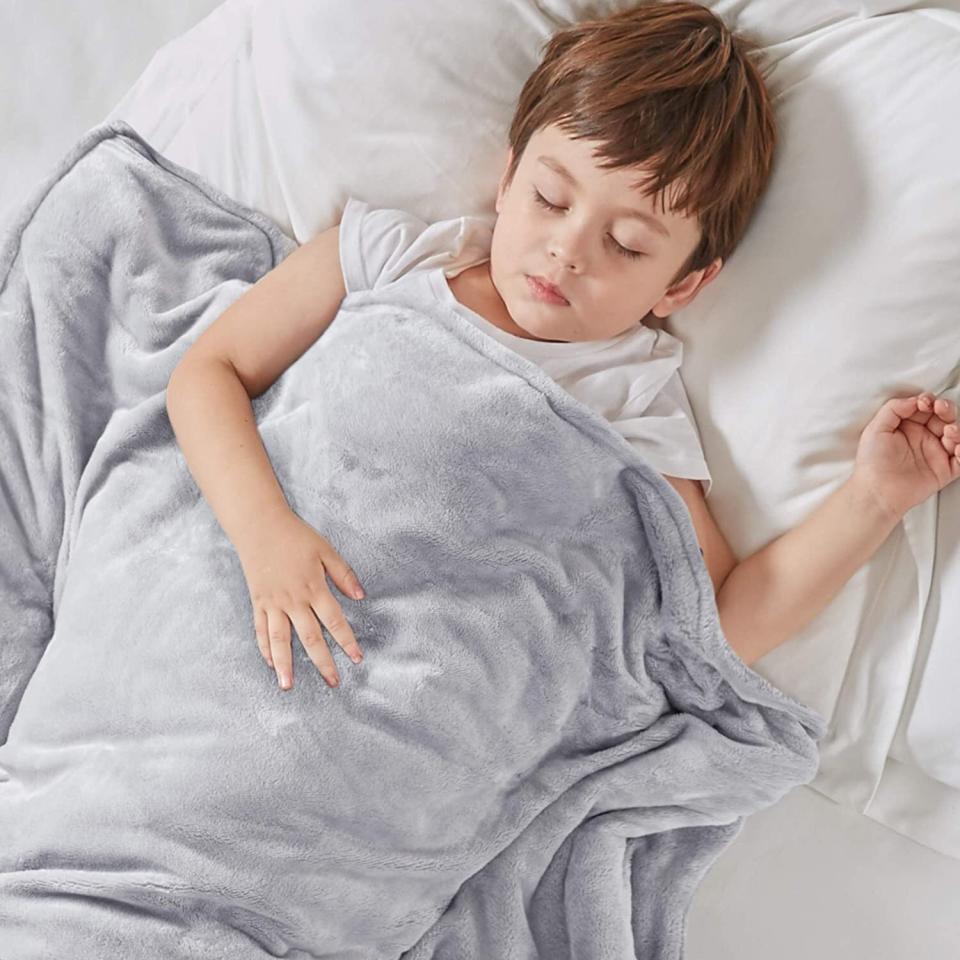 It comes with two divet covers &mdash; one is a cozy fleece and the other is made of a CoolMax Microfiber technology that can help ventilate heat away from your body.<br /><br /><strong>Promising review:</strong> "This blanket is wonderful! I was always curious to try a weighted blanket but was skeptical if they actually worked. After reading reviews, I thought I'd give it a try. I am so glad I did. I was having a hard time falling asleep and staying asleep. After receiving this blanket, my sleep has improved dramatically and I stay asleep most of the night. I like the option of having the cooling duvet and the warmer one. I am a hot sleeper so I stick with the cool one. The only downside to the blanket is changing the duvets you have to tie countless pieces together for it to stay in place but other than that this blanket is sooo worth it!!" &mdash; <a href="https://www.amazon.com/gp/customer-reviews/R40U77WO3RITT?&amp;linkCode=ll2&amp;tag=huffpost-bfsyndication-20&amp;linkId=6ccfa787153661fa5a145689e3f5ebb9&amp;language=en_US&amp;ref_=as_li_ss_tl" target="_blank" rel="noopener noreferrer">Emma</a><br /><br /><strong><a href="https://www.amazon.com/Degrees-Comfort-Weighted-Nano-Ceramic-Durability/dp/B07RXMDM81?th=1&amp;linkCode=ll1&amp;tag=huffpost-bfsyndication-20&amp;linkId=29e1208624381c9d595838875a30d595&amp;language=en_US&amp;ref_=as_li_ss_tl" target="_blank" rel="noopener noreferrer">Get it from Amazon for $42.99 (available in 14 sizes and six colors).</a></strong>