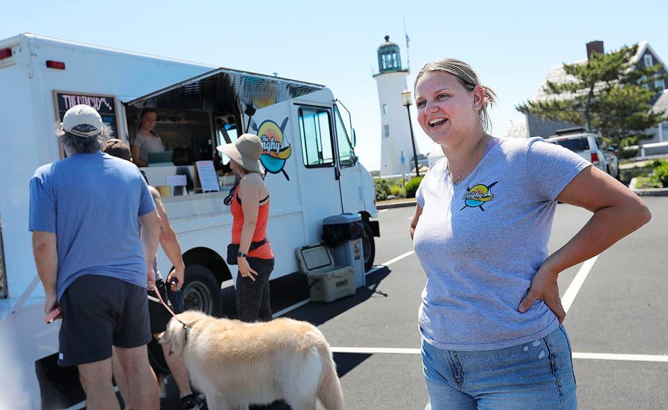 Owner Katie Neil outside The Dinghy food truck, which sells sandwiches at Scituate Light and Peggotty Beach.