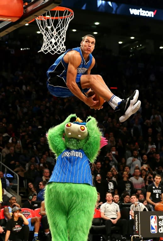 Aaron Gordon of the Orlando Magic dunks over Stuff the Orlando Magic mascot, during NBA All-Star Weekend at Air Canada Centre in Toronto, on February 13, 2016