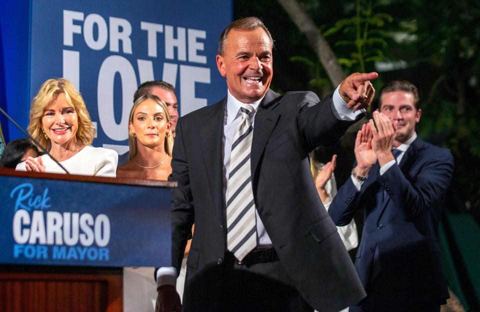 Rick Caruso, a Democratic candidate for Los Angeles mayor, celebrates at his primary-night gathering in Los Angeles, Tuesday, June 7, 2022, with his family behind him.