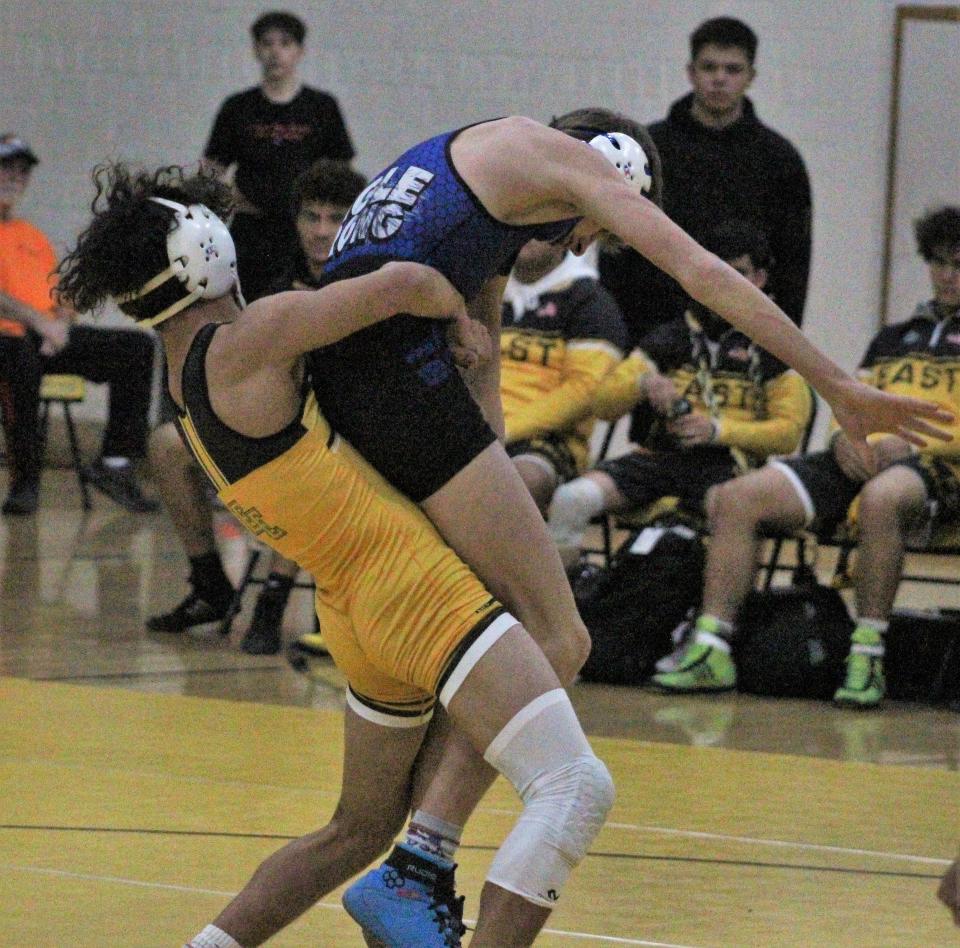 'Pocky' Amaro of Pueblo East lifts up his opponent from Broomfield during a Tri-meet held at Pueblo East High School on Dec. 14, 2022.