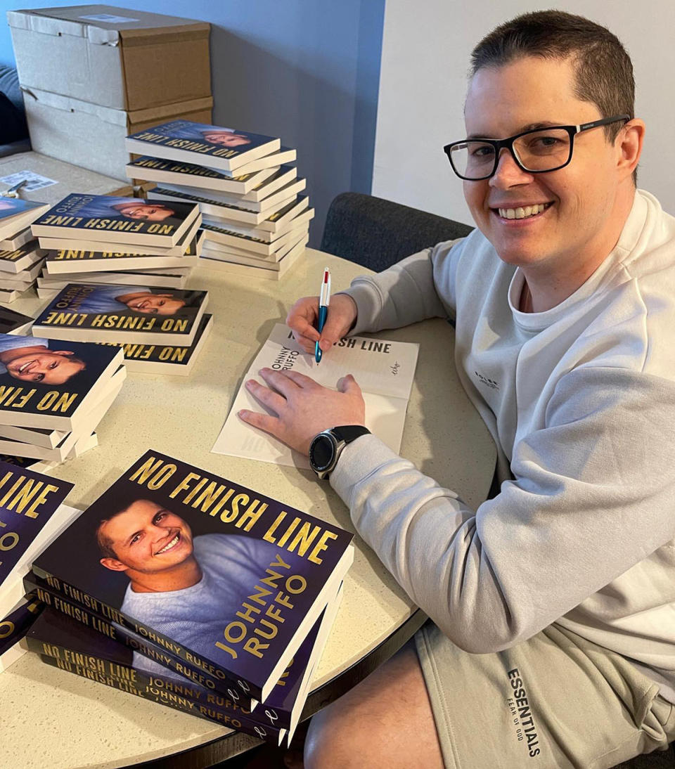 Johnny Ruffo signing copies of his book 'No Finish Line'