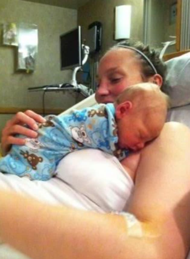 The author holding her newborn, Van, in the hospital in Denver, Colorado, after being readmitted with complications just weeks after he was born (2014). (Photo: Courtesy of Ryan Rae Harbuck)