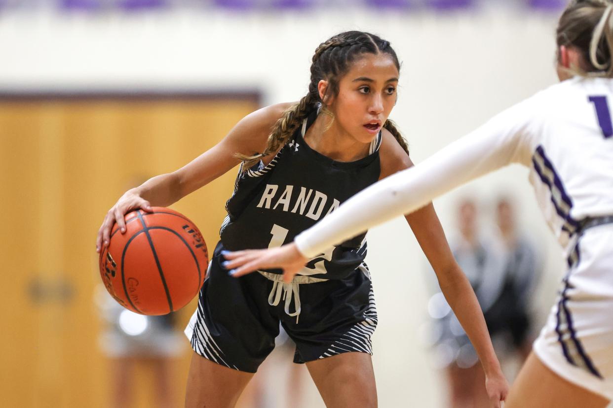 Randall’s Sadie Sanchez (12) looks over the defense in  a District 4-4A game Canyon, Tuesday, January 31, 2023, at Canyon High School, Canyon, Tx.  Canyon won 42-33.
