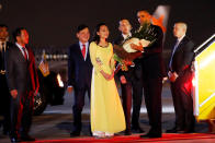 <p>U.S. President Barack Obama receives flowers as he arrives at Noibai International Airport in Hanoi, Vietnam May 22, 2016. (Carlos Barria/REUTERS) </p>