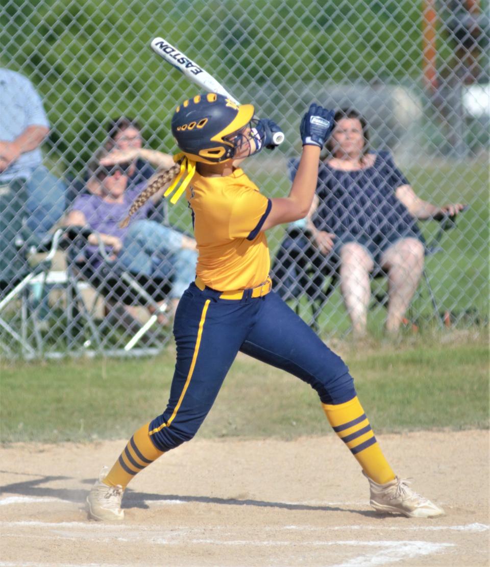 Aubrey Jones watches her home run fly during an MHSAA district softball matchup between Gaylord and Petoskey on Tuesday, May 30 in Gaylord, Mich.