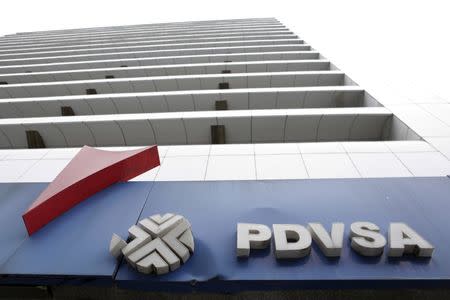 The PDVSA logo is seen at a gas station in Caracas, December 21, 2015. REUTERS/Marco Bello