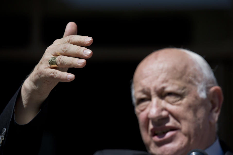 Cardinal Ricardo Ezzati, former archbishop of Santiago gestures during a news conference, Saturday, March 23, 2019 in Santiago, Chile. Pope Francis has replaced Ezzati , the embattled archbishop of Santiago, Chile, after he became embroiled in the country's spiraling sex abuse and cover-up scandal. (AP Photo/Esteban Felix)