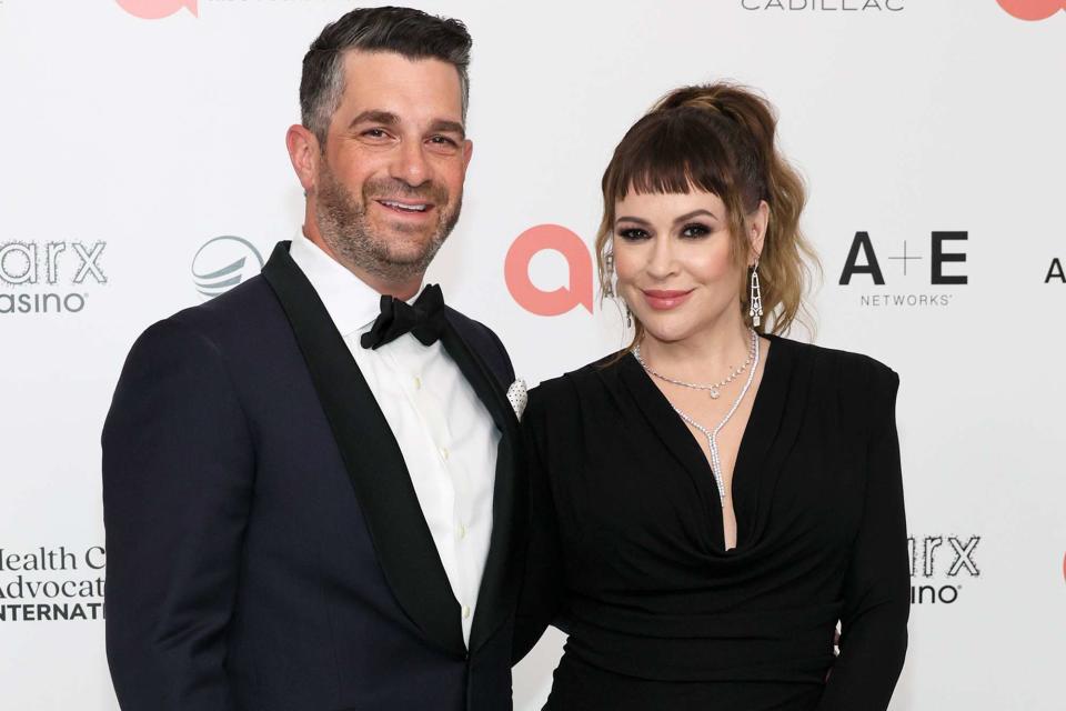 <p>Dia Dipasupil/WireImage</p>  David Bugliari and Alyssa Milano attend the Elton John AIDS Foundation