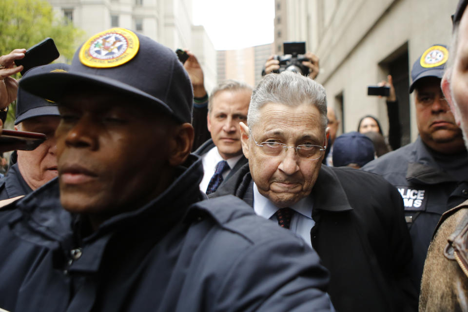 NEW YORK, NY - MAY 03: Former New York Assembly Speaker Sheldon Silver (C) is surrounded by media and USMS police court while he exits federal court in Lower Manhattan on May 3, 2016 in New York City.  Former New York state assembly speaker Silver was sentenced to 12 years in prison for corruption schemes that federal officials said captured $5 million over a span of two decades  (Photo by Eduardo Munoz Alvarez/Getty Images)