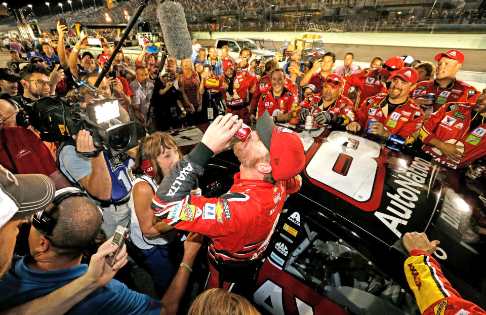 <p>Dale Earnhardt Jr., driver of the #88 AXALTA Chevrolet, celebrates with teammates after his final cup series race, the Monster Energy NASCAR Cup Series Championship Ford EcoBoost 400 at Homestead-Miami Speedway on November 19, 2017 in Homestead, Florida. (Photo by Jonathan Ferrey/Getty Images) </p>