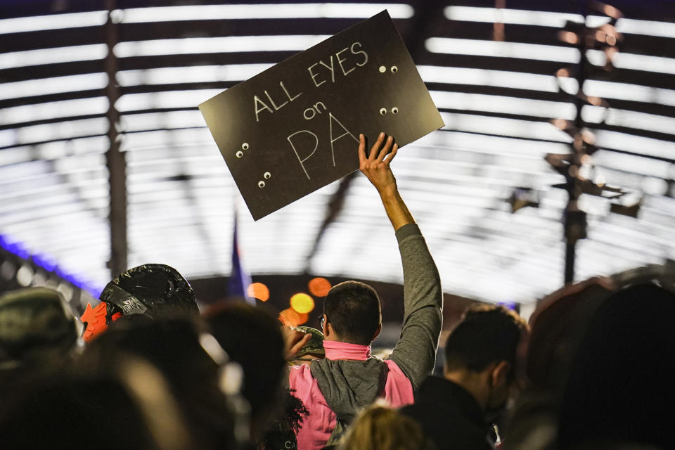Demonstrators supporting a full ballot count gather outside the Philadelphia Convention Center three days after the presidential election polls closed as they await tabulation results, Friday, Nov. 6, 2020, in Philadelphia. (AP Photo/John Minchillo)