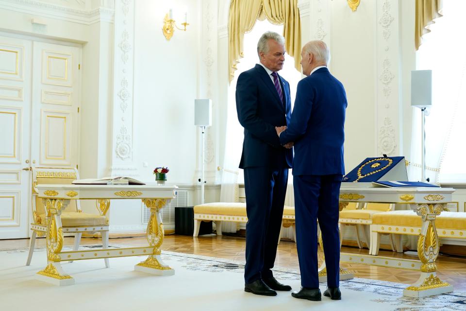 Lithuania’s President Gitanas Nauseda and Joe Biden meet at the Presidential Palace (AP)