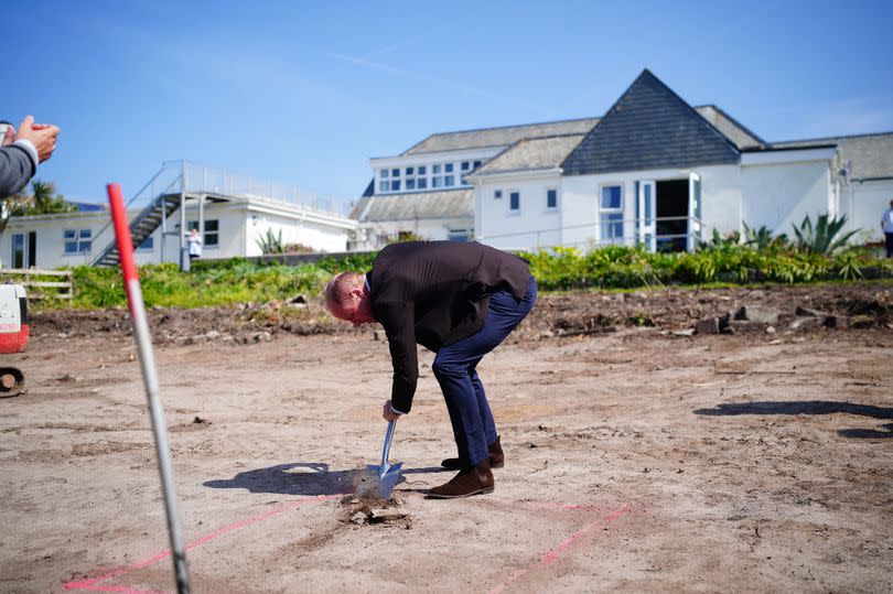 Pictured breaking ground for a new hospital facility -Credit:PA